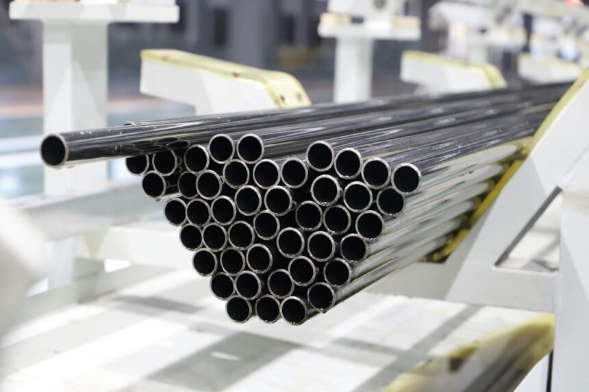 Industrial metal pipes on a factory production line