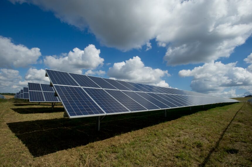 Solar panels representing large-scale renewable energy automation and construction