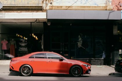 Cars outside automotive retail premises, illustrating dealership consolidation in Australia