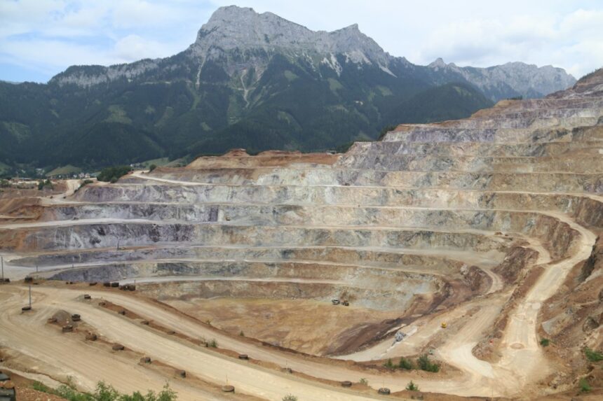 Open-cut iron ore mine; illustrative image, not a Rio Tinto Australian operation.
